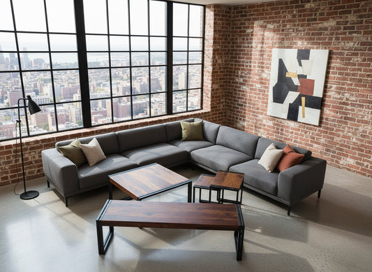Set of wooden coffee tables with metal legs in a living room setting.