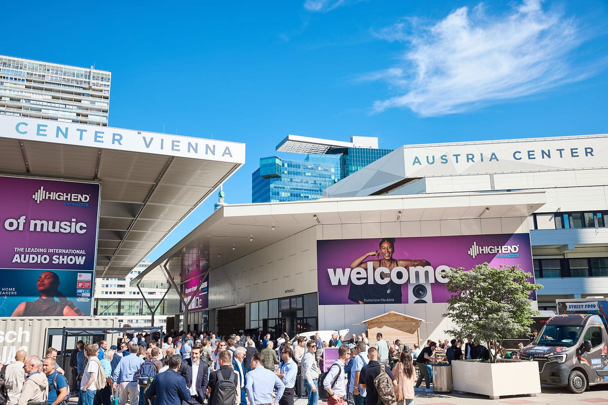 Visitors gathered outside the Austria Center Vienna beneath HIGH END Vienna show banners