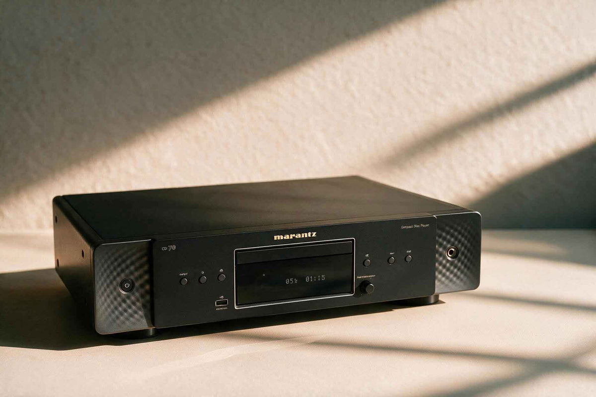 a black Marantz CD 70 sitting near a window